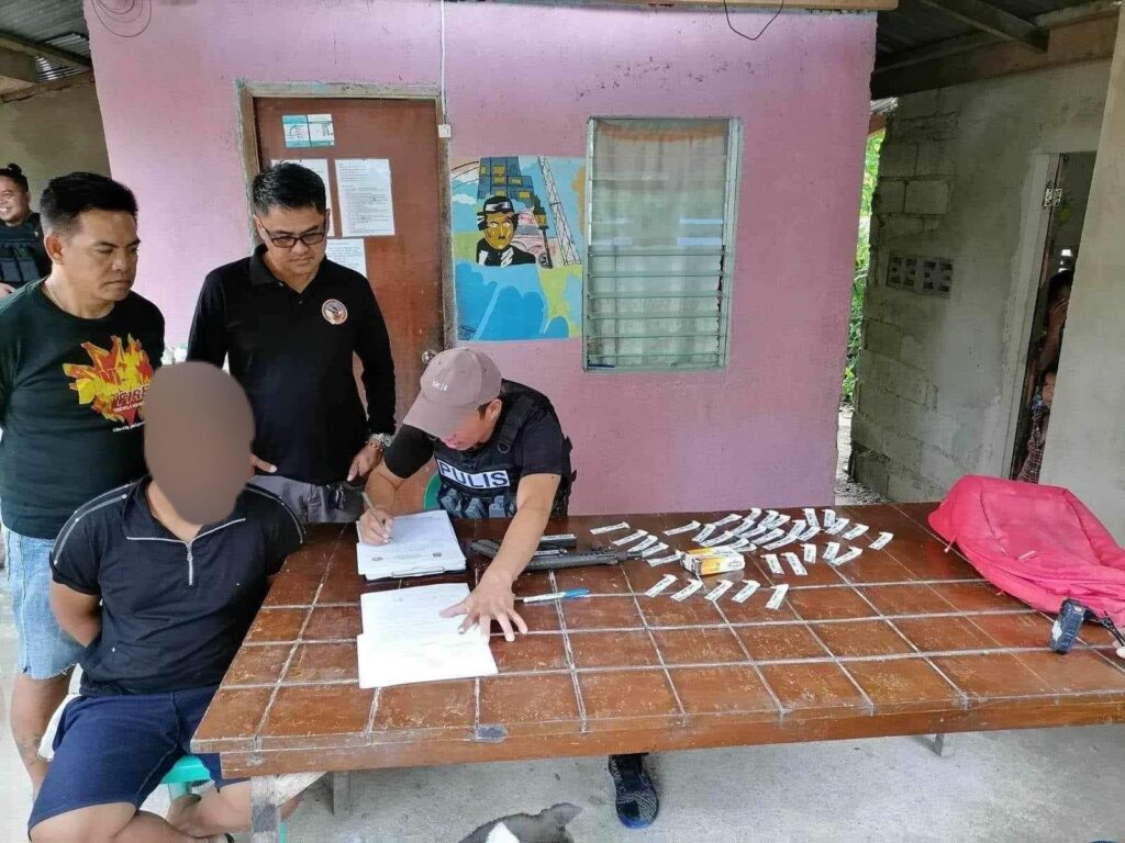 Construction workers caught with drugs, gun in separate police raids in Cebu City, Carcar. Kim Recillo is arrested after he was caught having an unlicensed submachine pistol inside his house in Barangay Pobalcion 3, Carcar City on July 12. | Carcar Police Station via Paul Lauro
