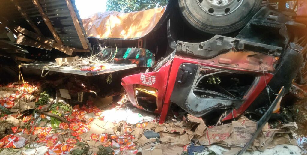 How sleeping late saved a lola, her family from a truck that fell from a ravine in Tabogon. This is the wreck of a 10-wheeler cargo truck that fell off a ravine and landed at the side of the house in Tabogon town in northern Cebu on July 30. | Paul Lauro
