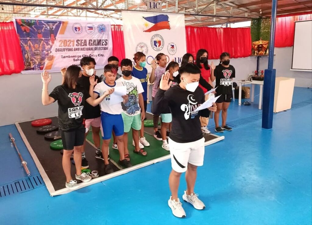Cebuana Olympian weightlifter Elreen Ando led the Oath of Sportsmanship in the SEA Games weightlifting qualifying competition at the UC weightlifting gym in downtown, Cebu City, in this CDN Digital file photo in 2022.