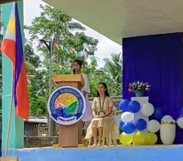 Cristia Balistoy shares her heartbreaking story during this July 2023 graduation in Canlampong Elementary School in Barangay Canlampong, Dimiao town in the province of Bohol. | Screen grab from video
