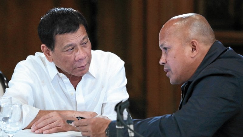 FILE PHOTO: President Rodrigo Duterte (left) and Senator Ronald “Bato” dela Rosa. INQUIRER FILES
