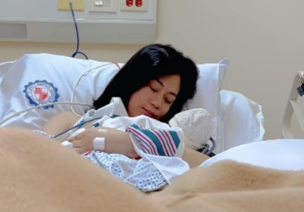 Toni Gonzaga in her hospital bed with her baby Paulina Celestine.