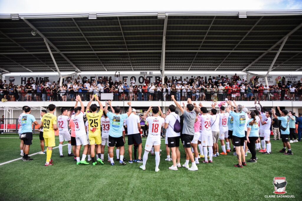 Cebu FC players and officials face their fans watching at the stands in one of their PFL matches at the  Dynamic Herb-Borromeo Sports Complex in April 2023.