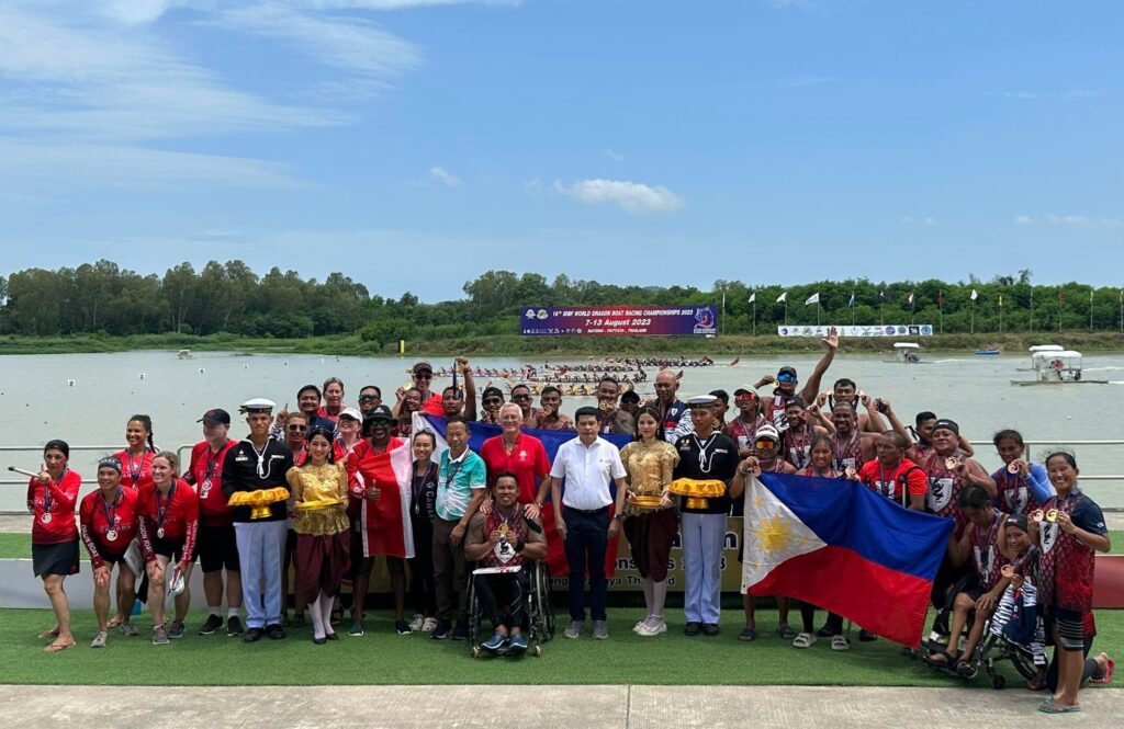 PADS dragon boat team pose for a group photo during the awarding ceremony of the 16th IDBF world championships in Pattaya, Thailand.