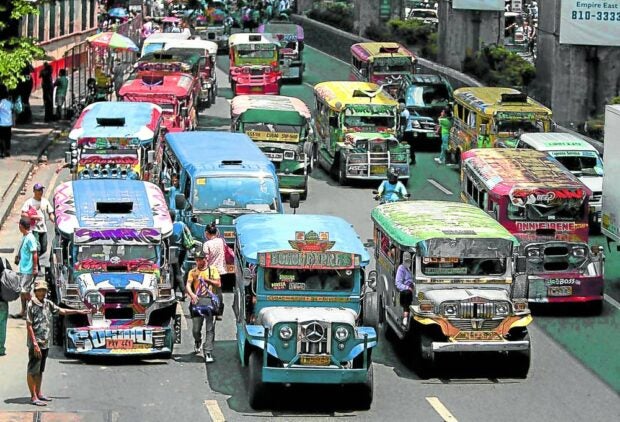 PUVS Jeepneys ply along Aurora Boulevard in Cubao, Quezon City in this picture taken on March 23, 2017. 