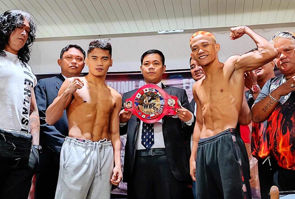 Miel Fajardo (left) and John Paul Gabunilas (right) strike a pose during the official weigh-in for their Oriental and Pacific Boxing Federation (OPBF) light flyweight title showdown on Monday, August 14, 2023, at the Mactan Island Convention Center.