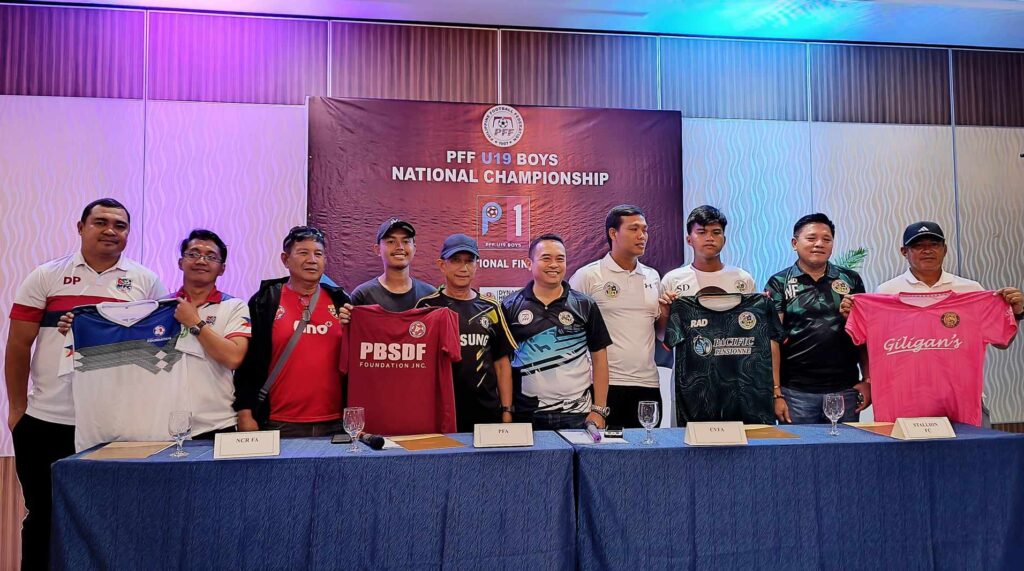 The head coaches and team captains of the four competing football associations in the PFF U19 Boys National Championship pose for a group photo during a presser on Monday, Aug. 21, 2023.
