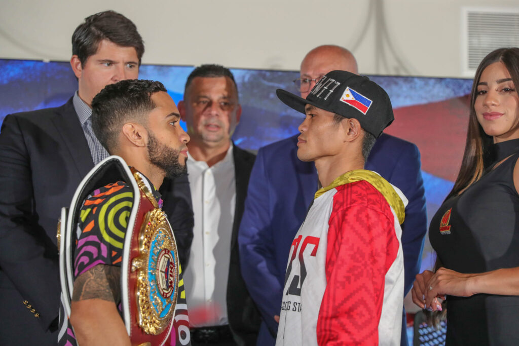 Oscar Collazo (left) and Garen Diagan (right) face each other after the press conference for their world title bout in San Juan, Puerto Rico.