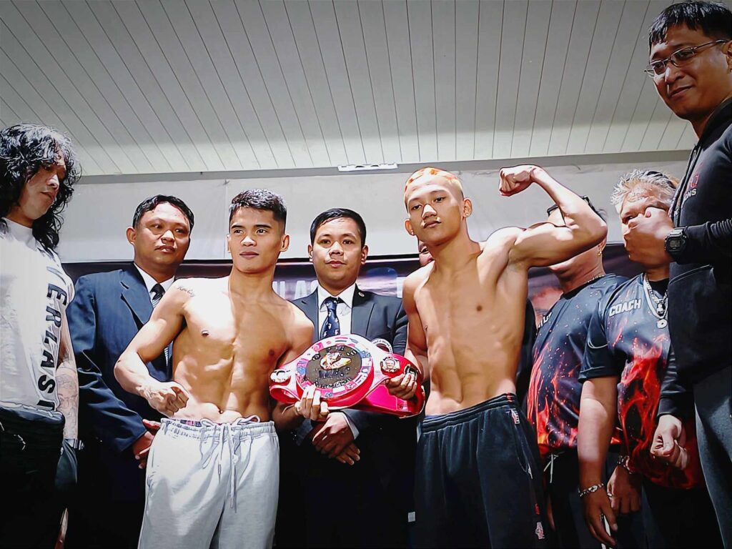Miel Fajardo (left) and John Paul Gabunilas (right) strike a pose during the official weigh-in for their Oriental and Pacific Boxing Federation (OPBF) light flyweight title showdown on Monday, August 14, 2023, at the Mactan Island Convention Center. | Glendale Rosal