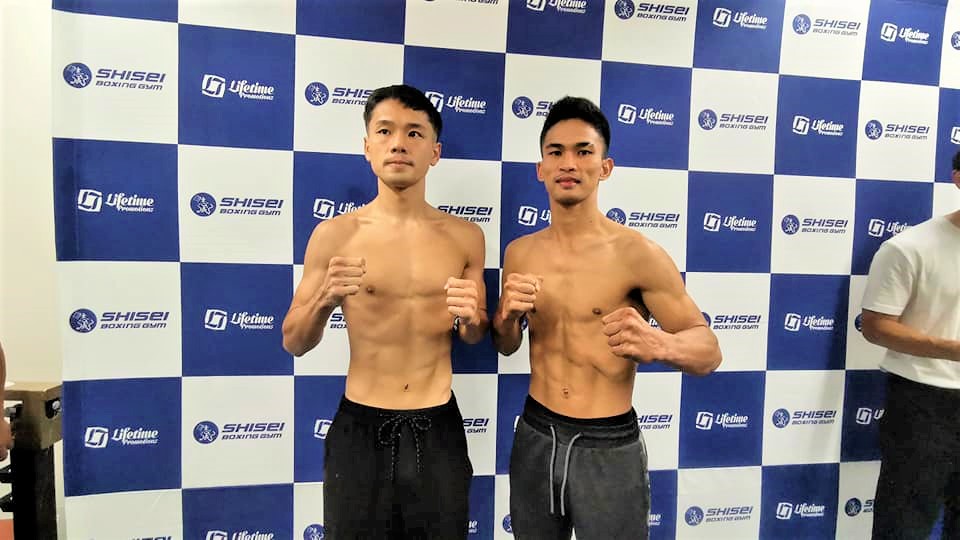 Toshihiro Suzuki (left) and Virgel Vitor (right) pose for photos after passing the weigh-in of their eight-rounder bout in Tokyo, Japan. | Photo from PMI Bohol Boxing Stable Facebook page