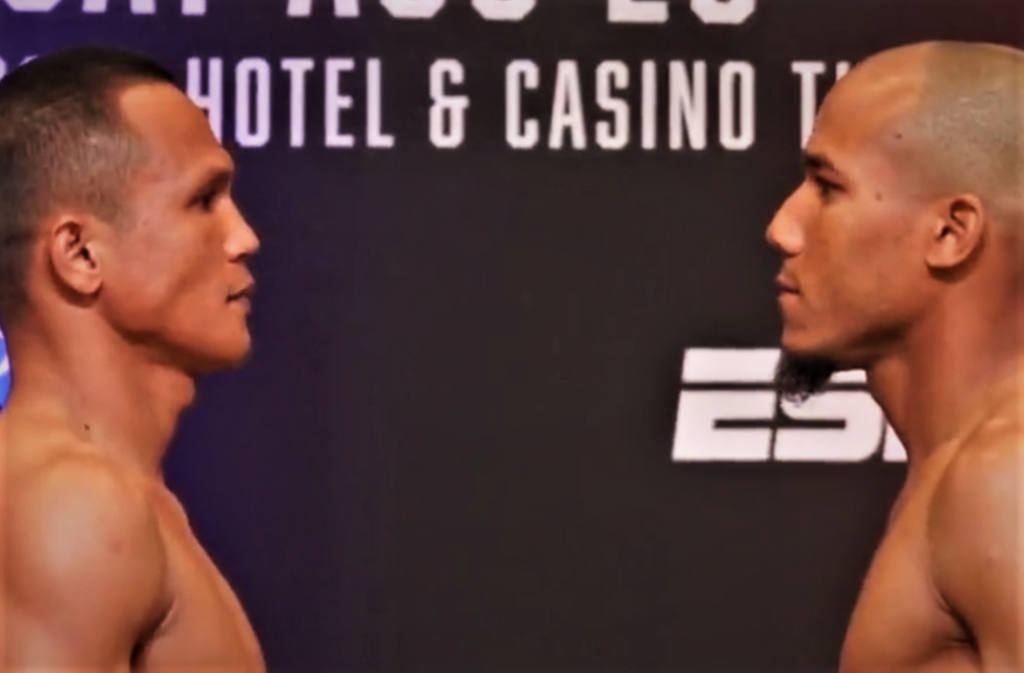Charly Suarez (left) and Yohan Vasquez (right) engage in a staredown during the weigh-in of their 10-rounder bout in Tulsa, Oklahoma. | Screen grab from Top Rank's X Video