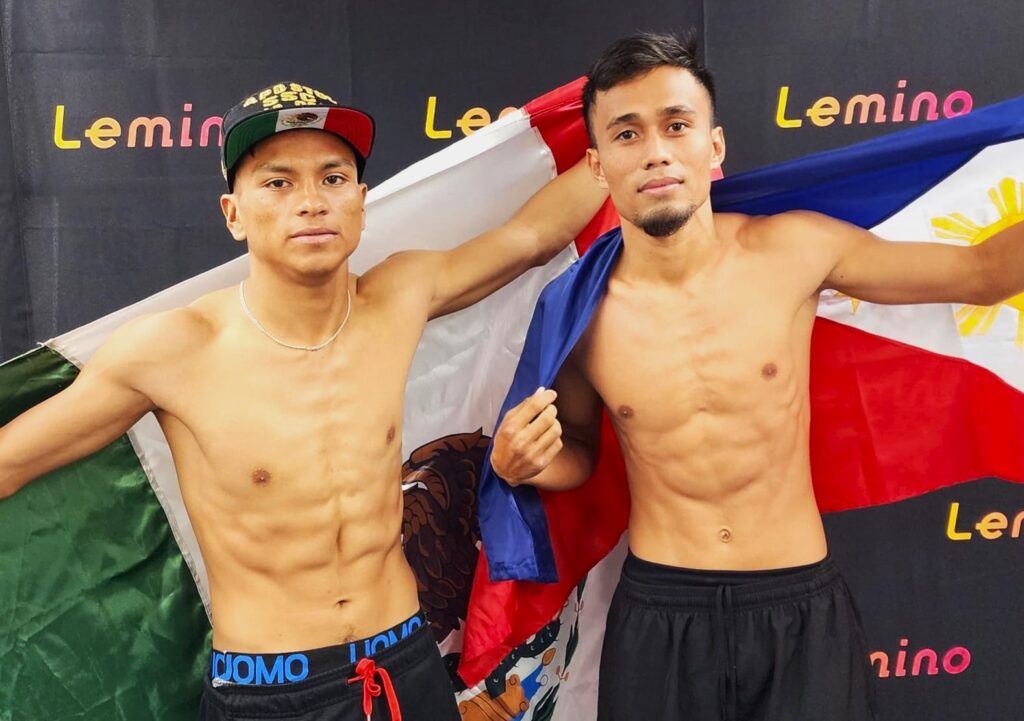 Dave Apolinario (right) and Brian Mosinos (left) posing for the camera while holding their respective national flags during the weigh-in for their 8-round pro boxing fight in Tokyo, Japan. | Photo from Sanman Boxing.