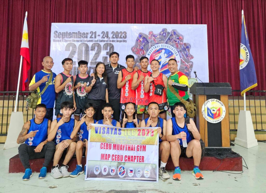 Team Cebu City Muay Thai fighters and coaches pose for a photo after the Muay Thai Regional Championships-Visayas Leg 2023.