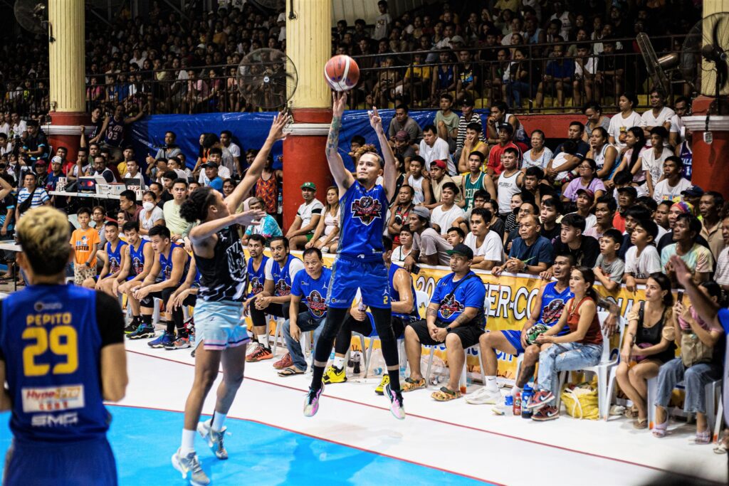 Patrick Cabahug of AC Troopers fires a long-distance shot in one of their games of the ongoing Balamban Fiesta Cup 2023 Inter-Commercial Basketball Tournament.