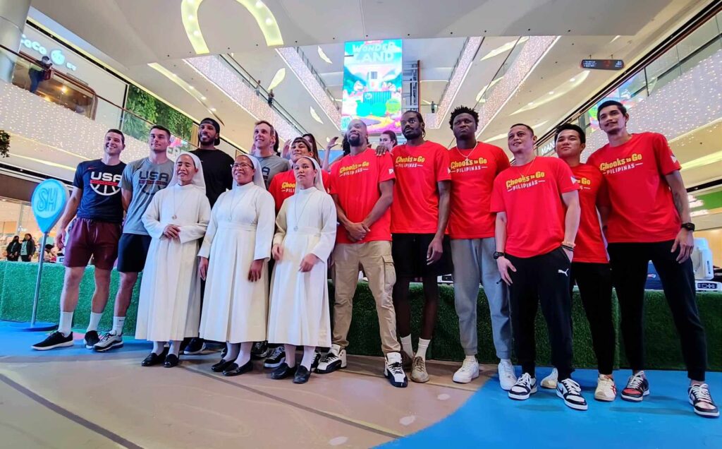 Team members of the Manila Chooks and Miami-USA pose for a group photo with the nuns of the Sisters of Mary School (SMS) Boystown during the press conference of the Chooks-to-Go Chooks-to-Go FIBA 3×3 World Tour Cebu Masters held at the SM Seaside City Cebu.