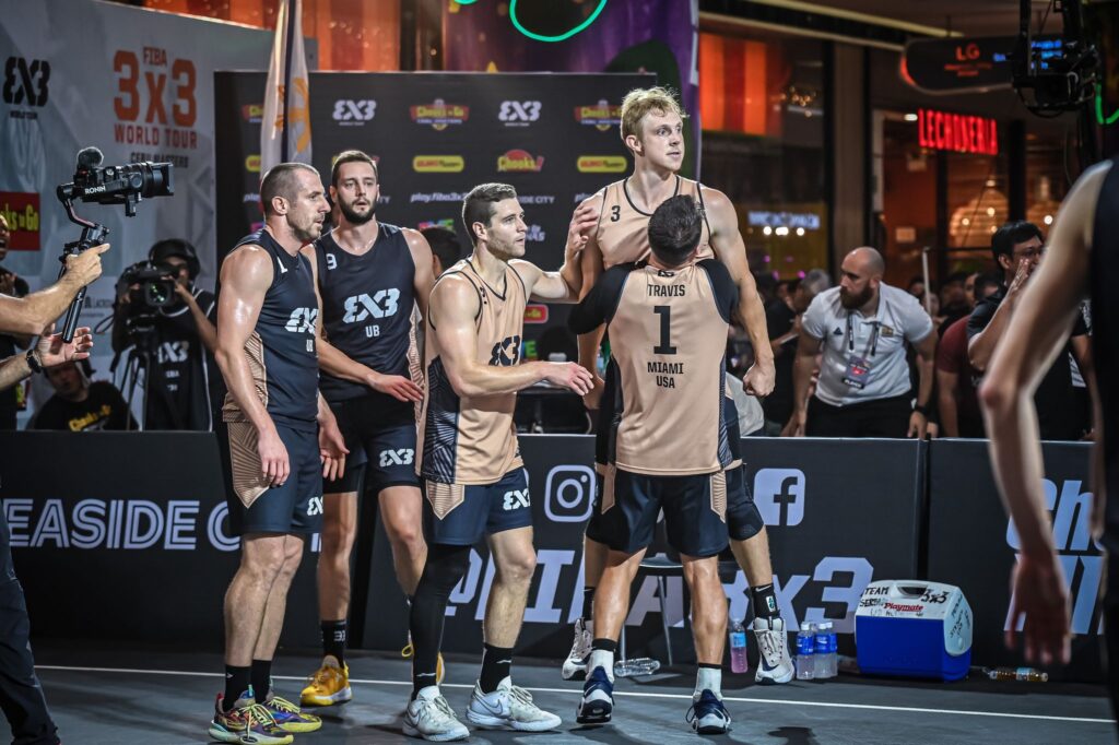 Dylan Travis of Miami-USA carries his teammate, Canyon Barry, after the latter sank the game-winning shot against UB Huishan NE-Serbia in the semifinals of the FIBA 3x3 World Tour Cebu Masters.