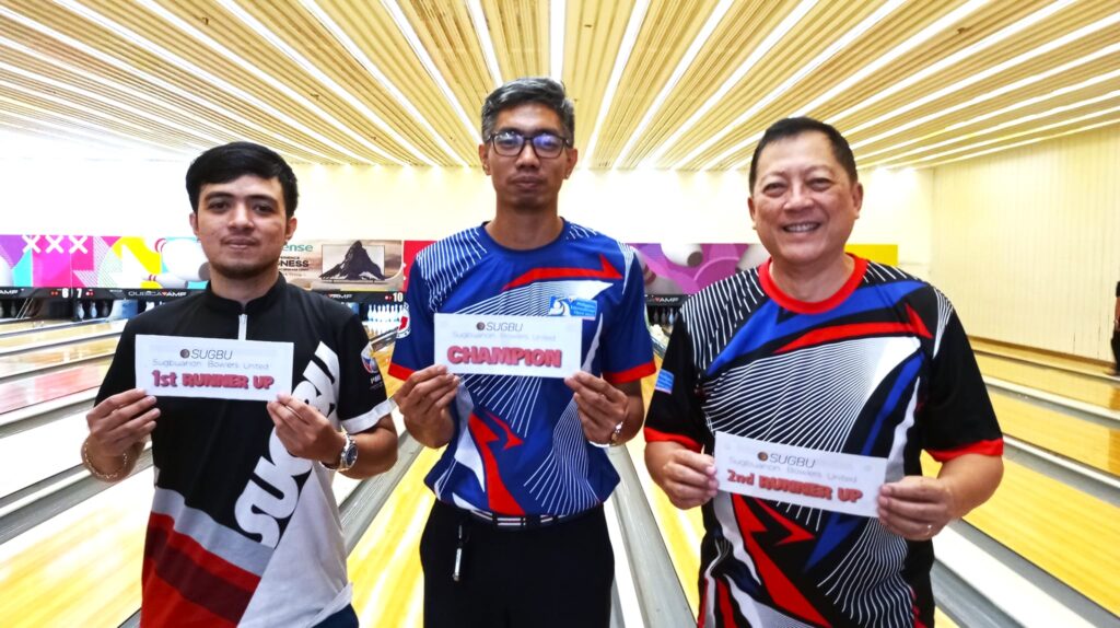 Luke Bolongan (middle) joins fellow bowlers John Galindo (left) and Marvin Sevilla (right) during the awarding of the SUGBU Bowling Shootout Tournament.