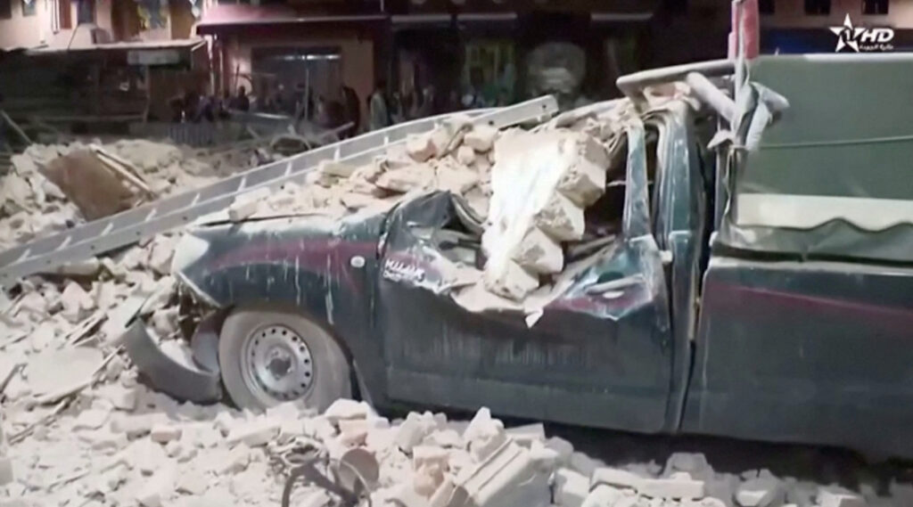 Morocco earthquake. View of a damaged car and debris from the earthquake in Marrakech, Morocco September 9, 2023 in this screen grab taken from a video. Al Oula TV/Handout via REUTERS 
