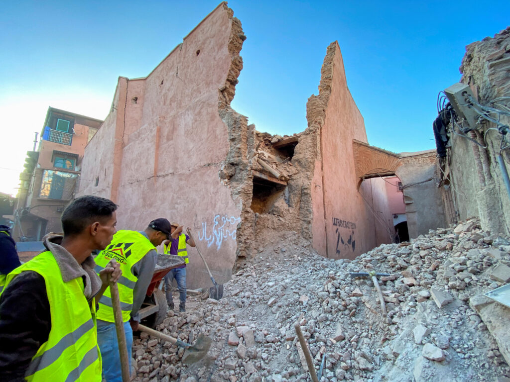 Morocco earthquake kills more than 2,000 people, survivors sleep outdoors. In photo are people working next to damage in the historic city of Marrakech, following a powerful earthquake in Morocco, September 9, 2023. REUTERS/Abdelhak Balhaki