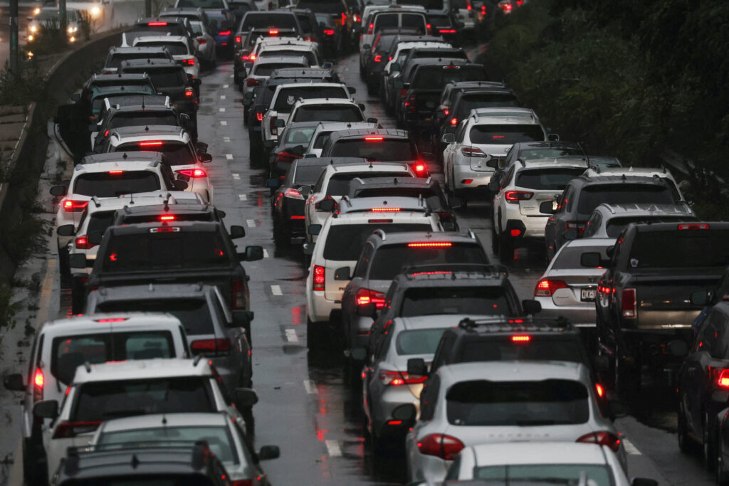 Cars sit at a standstill, as the remnants of Tropical Storm Ophelia bring flooding across mid-Atlantic and Northeast, closed the south bound Cross Island Parkway in the Queens borough  in New York City, U.S., September 29, 2023.  REUTERS/Shannon Stapleton