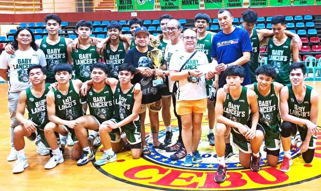 The UV Baby Green Lancers players and team officials pose for a photo during the awarding of the Dodong Junie Martinez CESAFI 2023 Pre-Season Juniors Invitational Basketball Tournament in Bogo City. | Contributed photo