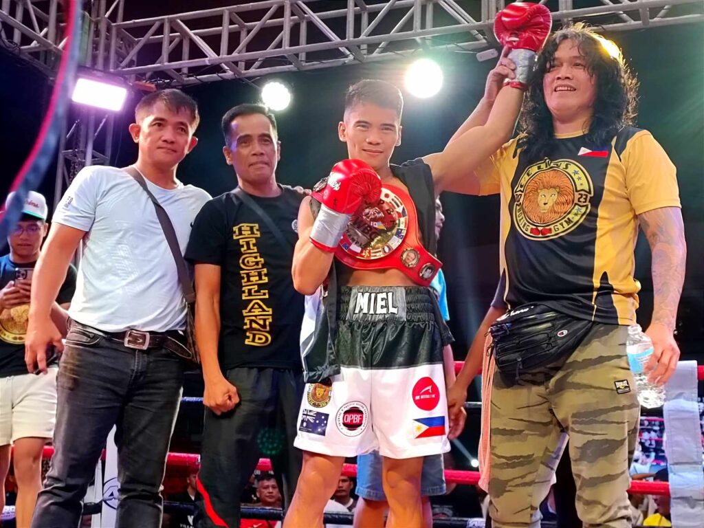 Miel “Silent Assassin” Fajardo (3rd from left), who stopped John Paul Gabunilas in the first round of their fight at the Hoops Dome in Lapu-Lapu City, has been recognized by the Games and Amusement Board as its Boxer of the Month for August. |