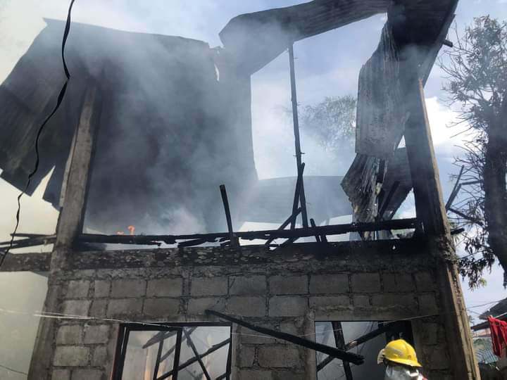 Boy saves sleeping mom, sister from burning house in Minglanilla, Cebu. In photo is an afternoon fire in Minglanilla town on September 26, 2023, that destroyed a two-storey house there. | LGU Minglanilla via Paul Lauro