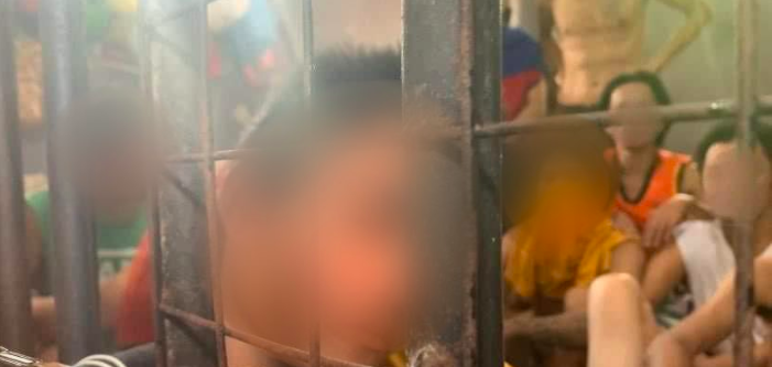 Simeon Gabutero, inside the detention cell in Labangon Police Station, denied being coerced into confessing to the murder of Reah Mae Tocmo. | via Emmariel Ares