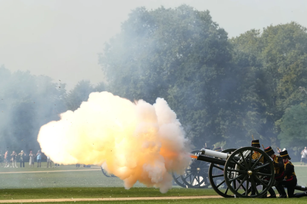 The King's Troop Royal Horse Artillery fire a 41 Gun Royal Salute supported by the Band of the Grenadier Guards, on the first anniversary of the death of Queen Elizabeth II, in Hyde Park, London, Friday, Sept. 8, 2023.