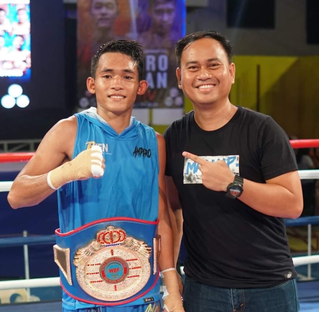 Jake Amparo (left) and his promoter and manager Floriezyl Echavez-Podot of PMI Bohol Boxing Stable.