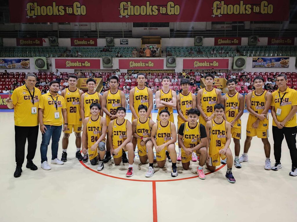 CIT-U Wildkittens players and coaching staff pose for a group photo after winning their game in the Cesafi over the DBTC Greywolves.