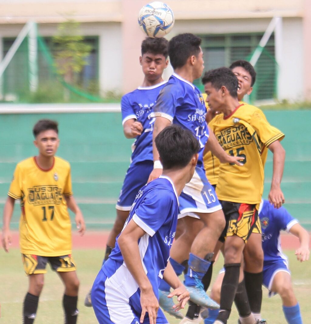 SHS-AdC and USJ-R booters battle for ball possession in last year's Cesafi high school football tournament.