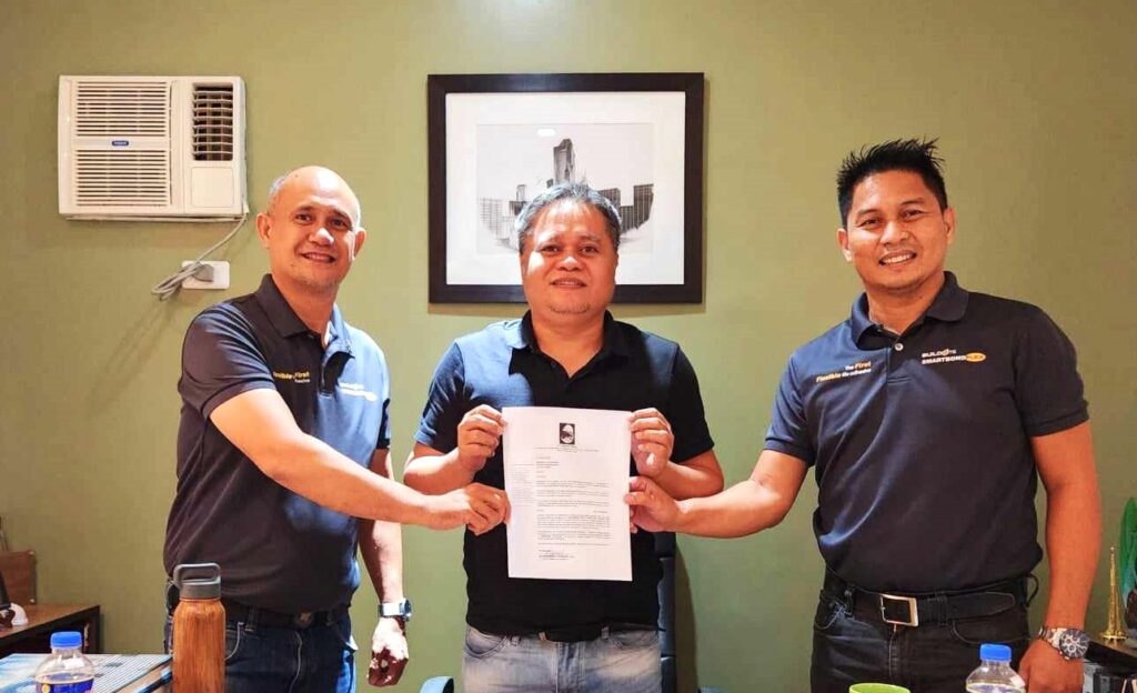 (L-R) Buildrite District Manager Noel Porter, A+E Vice President for Operations Architect Josephril Partosa, and Buildrite National Sales Manager Gerald Lentorio pose for a photo after inking a partnership in the first A+E Buildrite Basketball Cup.