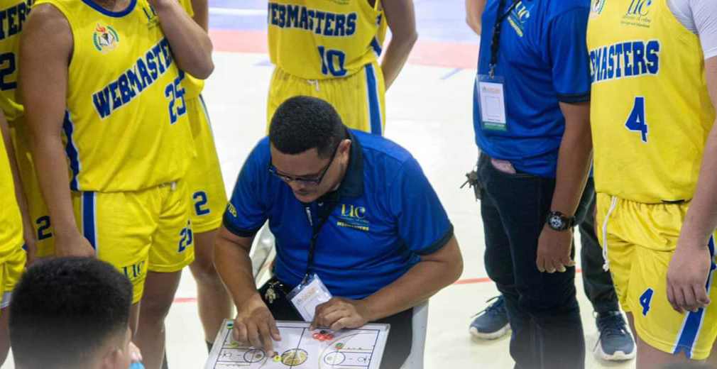UCLM Webmasters' head coach Caleb Gawangan brief his players during a timeout in one of their games in the Cesafi.