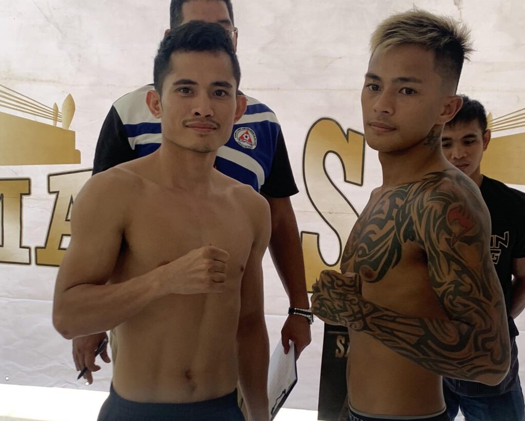 Melvin Jerusalem (left) and Francis Jay Diaz (right) pose for a photo after their weigh-in on Saturday, October 28.
