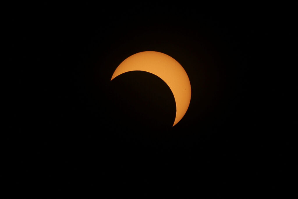 A solar eclipse is observed at the Chichen Itza archaeological zone, in Piste, Mexico, October 14, 2023. REUTERS/Lorenzo Hernandez