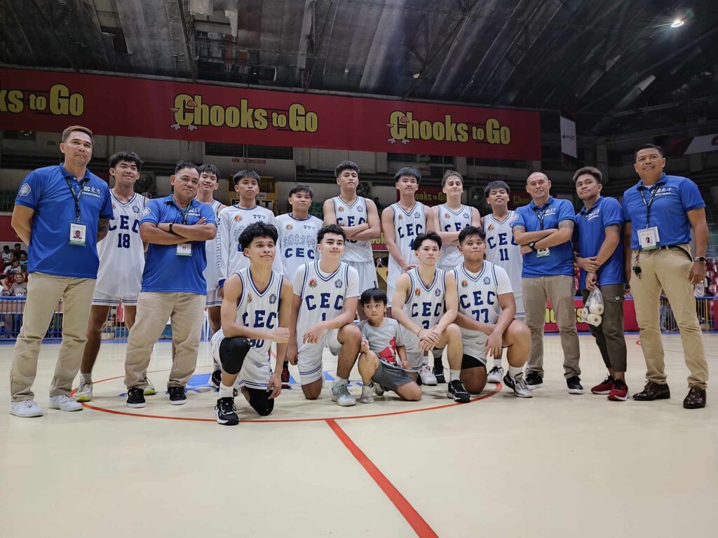 CEC Dragons destroy USC Baby Warriors in Cesafi high school basketball game. IN PHOTO are CEC Dragons players and coaching staff posing for a group photo at centercourt. | Glendale Rosal