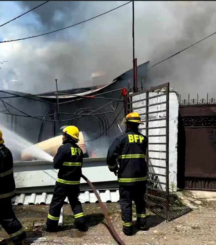 Firefighters battle a fire that hit a house in a residential area of Barangay Guadalupe, Cebu City this morning, October 15, 2023. | Contributed photo via Paul Lauro