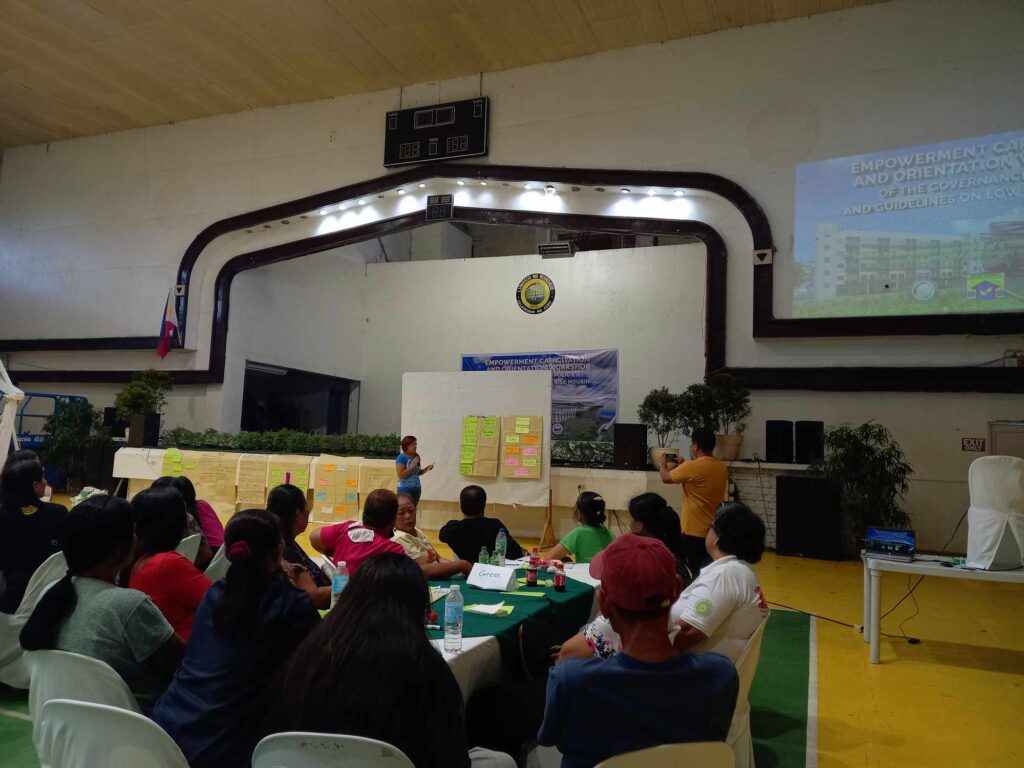 Beneficiaries of the first building of the low-rise housing project of the Mandaue City government undergo a workshop on the guidelines of the housing program. | Mary Rose Sagarino