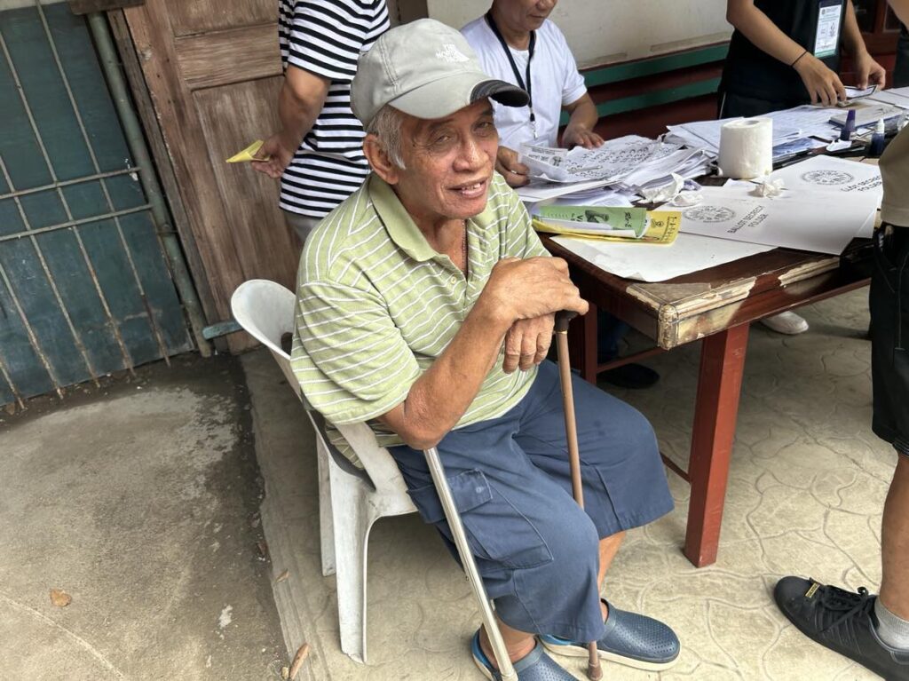 Using crutches, tatay Roque Del Rosario, 76, goes to the Abellana National School in Cebu City to cast his vote in the Barangay and SK elections on Monday morning, October 30.