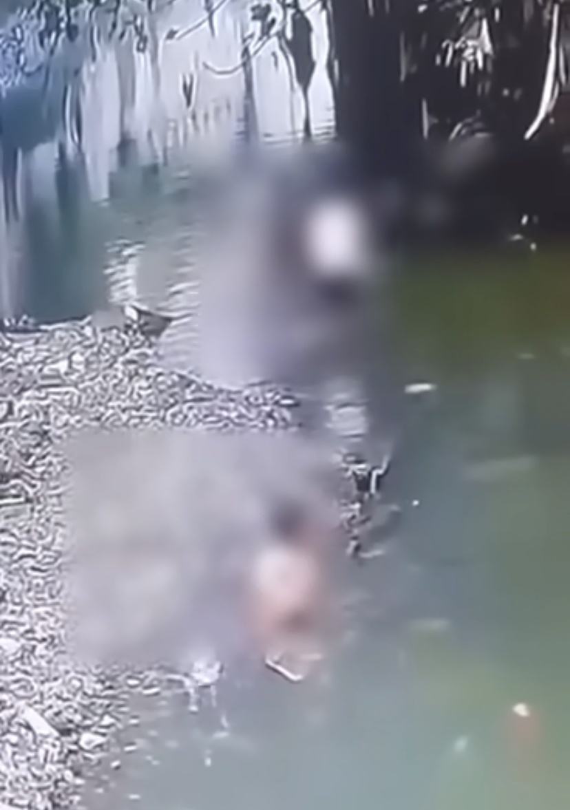 Boy, 4, drowns after he fell into Cebu City river after chasing bottle floating in the water. CCTV footage shows the moment when a 4-year-old boy was playing and accidentally fell in a river in Sitio Tender, Barangay Day-as, Cebu City which lead to him drowning on Saturday, October 7,2023. | Screenshot from contributed CCTV video