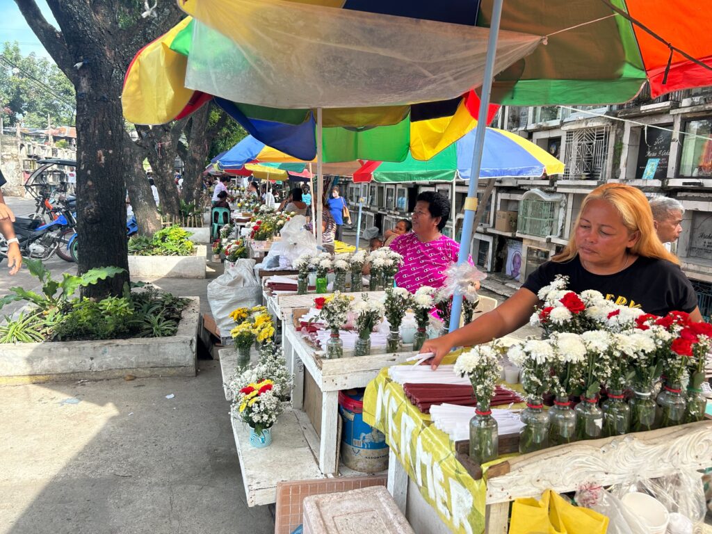 Flower vendors at the Calamba Cemetery have started to set up shop as they expect more visitors at the cemetery as the Kalag-Kalag draws near. | Recca Romulo