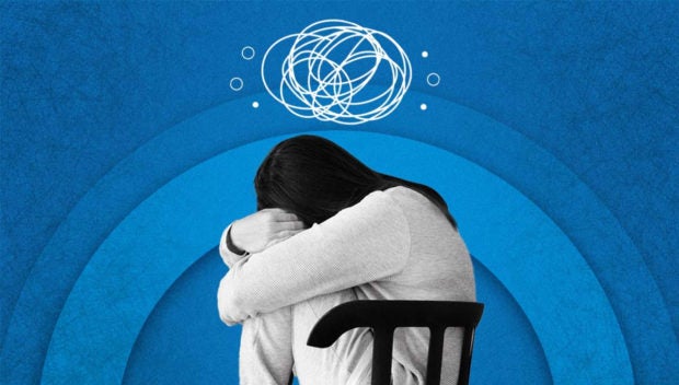 Mental health woes: DOH-7 urges public to call hotlines when they need help. Photo is a stock photo of a depressed person of Inquirer.net. | File photo Inquirer.net