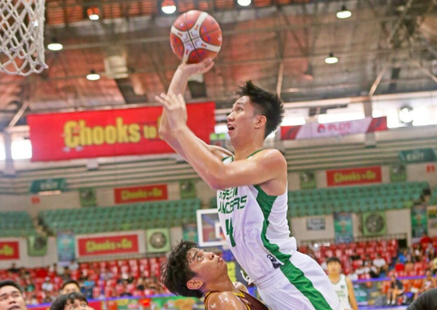 UV Green Lancers to face Cesafi newbies FVFC Blue Dragons on Oct. 12 . King Harvie Orcullo (4) of UV attempts a difficult shot against CIT-U's Josiah Villamayor during their Cesafi men's basketball game. | Photo from Sugbuanong Kodaker
