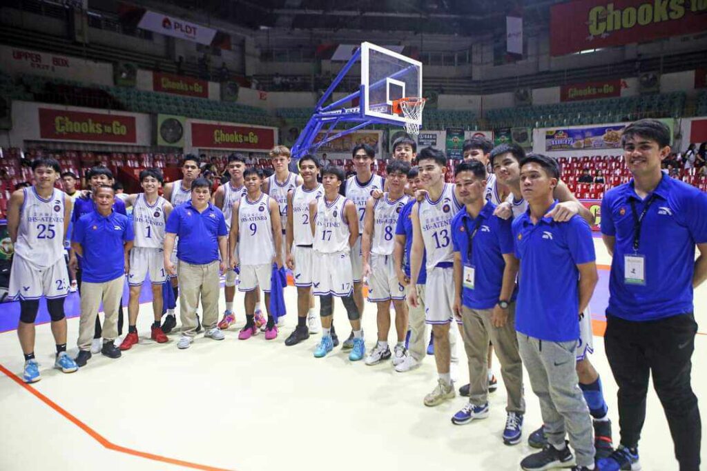 The SHS-AdC Magis Eagles players and coaching staff pose for a photo after their game in the Cesafi. 