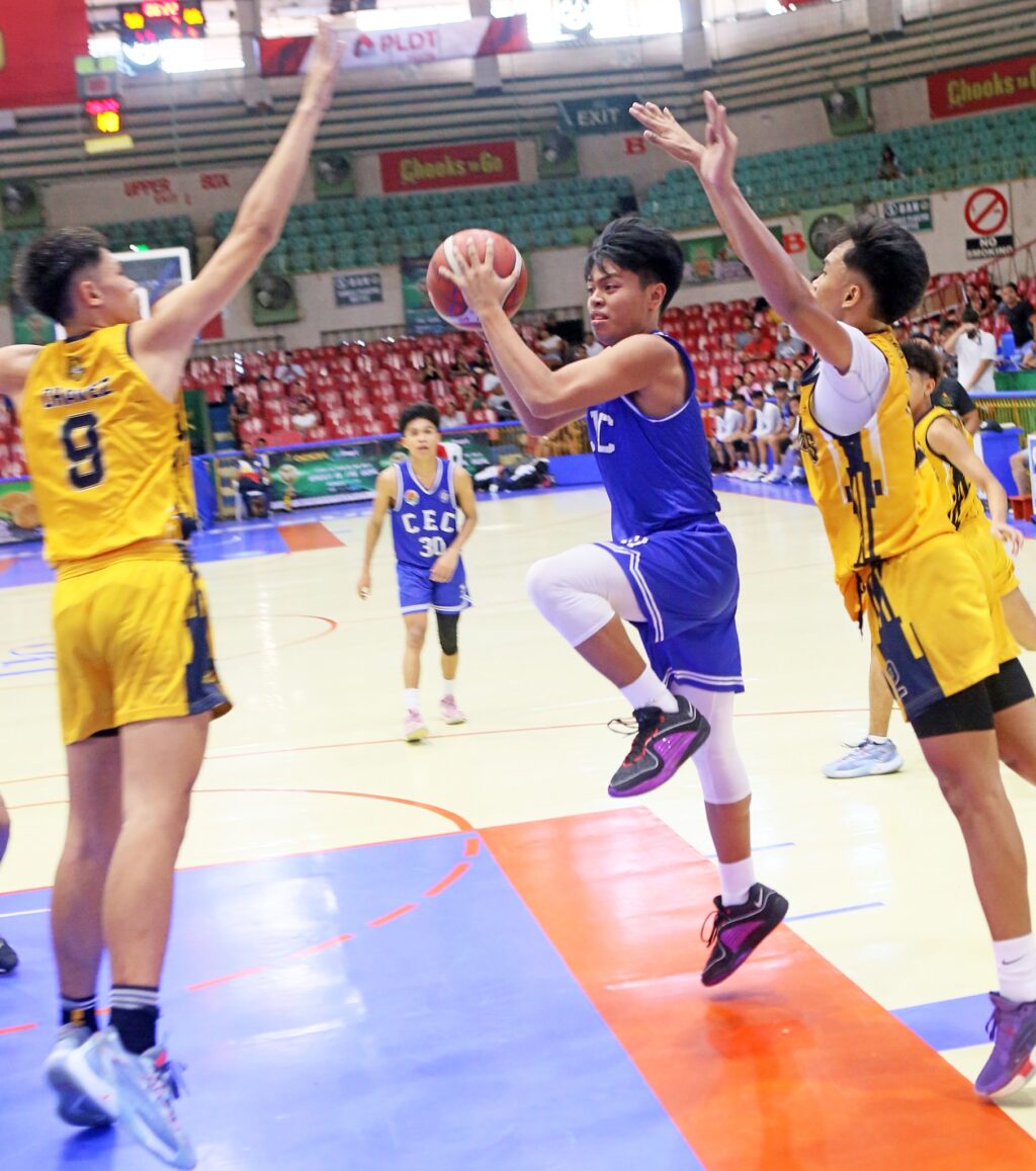 CEC's Xerxes Yael Duran attacks the basket during their Cesafi high school game against the USPF Baby Panthers. The CEC Dragons will face USJ-R Baby Jaguars on Tuesday.