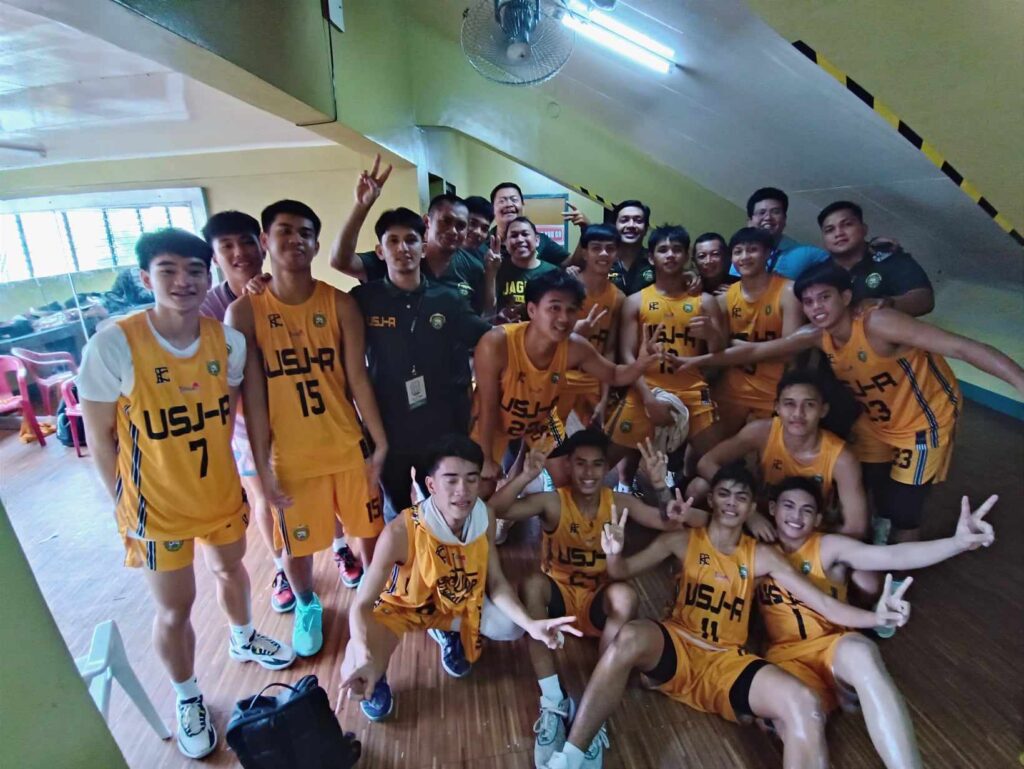 USJ-R Baby Jaguars players and coaching staff pose for a group photo after winning against the UV Baby Green Lancers in their game in the Cesafi on Saturday, Nov. 18, 2023.