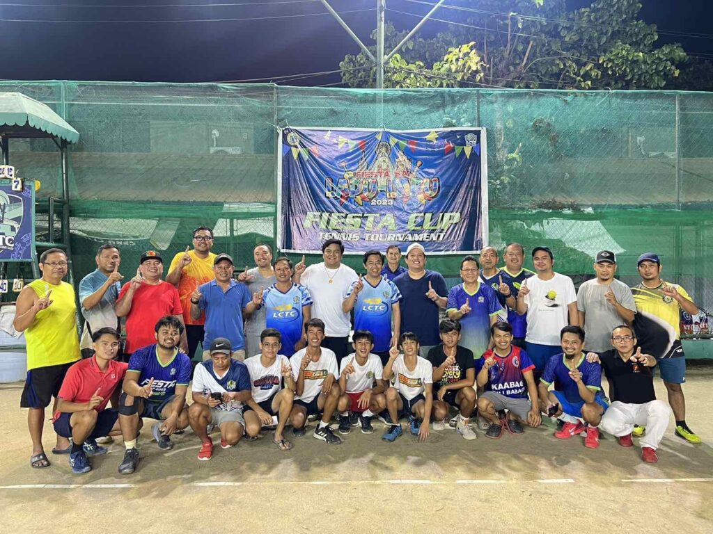 Chan, Pitalcoren champs in C+ Category of Lapu-Lapu City Fiesta Lawn Tennis tourney. In photo are Mayor Junard Chan and other players pose for a photo after the awarding ceremony.