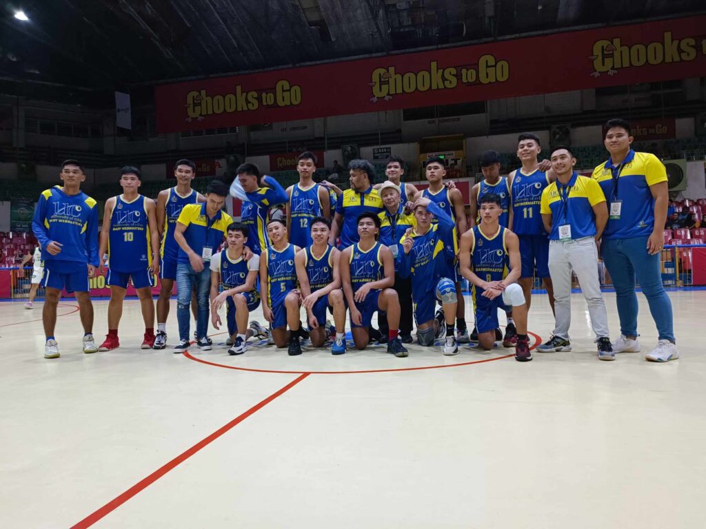 UC Baby Webmasters team officials and players pose for a photo after their game in the Cesafi on Thursday, November 23, 2023.