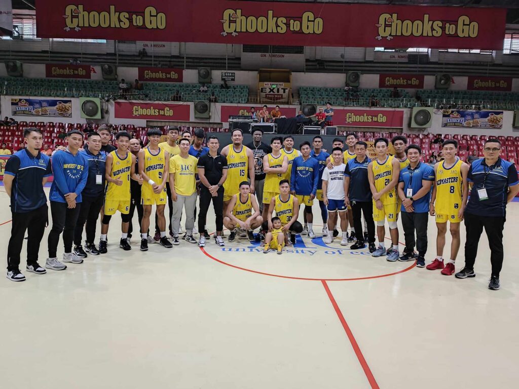 UC Webmasters players and coaching staff pose for a photo at center court after beating the Benedicto College Cheetahs in their game in the Cesafi on Saturday, November 25, 2023.